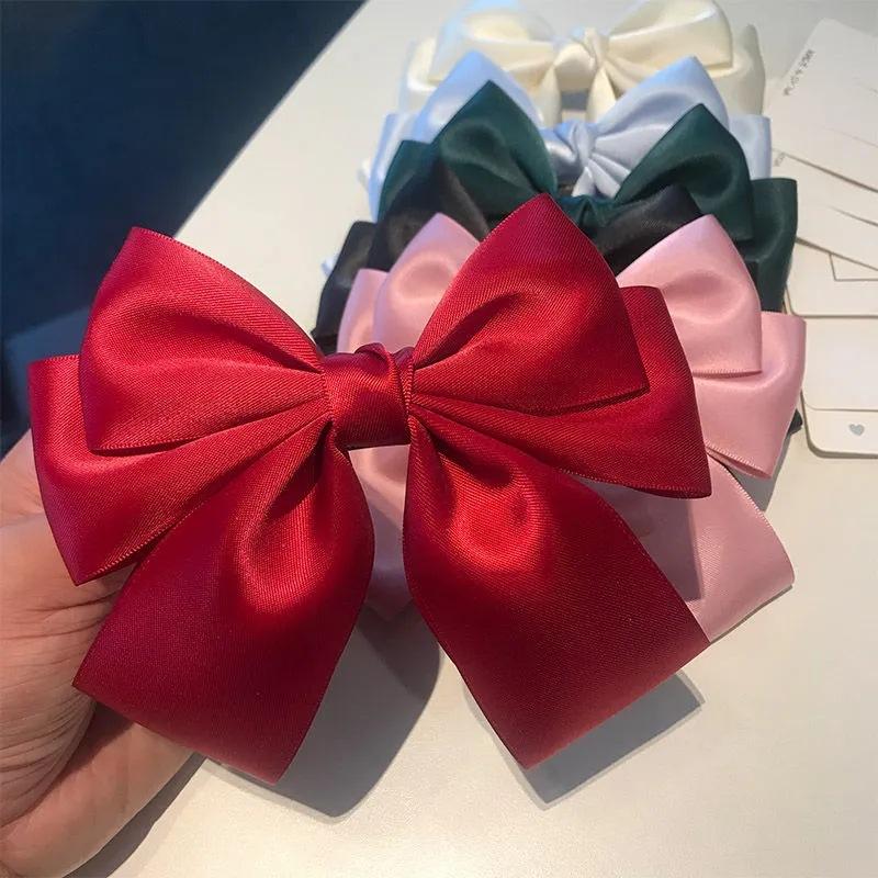 กิ๊บติดผมริบบิ้นโบว์สีพื้นแบบใ - Ribbon Bow Gift บทวิจารณ์และราคา
