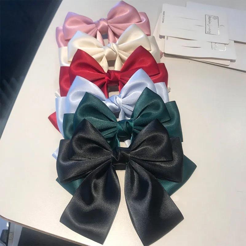 กิ๊บติดผมริบบิ้นโบว์สีพื้นแบบใ - Ribbon Bow Gift บทวิจารณ์และราคา